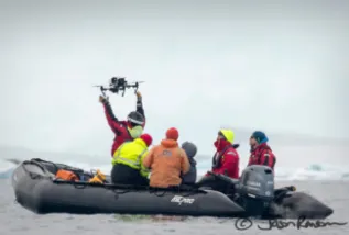 Jason Ransom Researcher Launching Drone To Study Humpback Whales